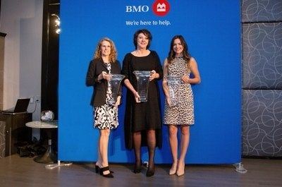 Ladies Holding their trophies