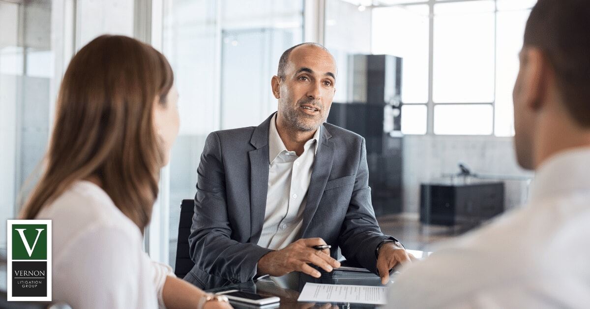 financial advisor talking with clients