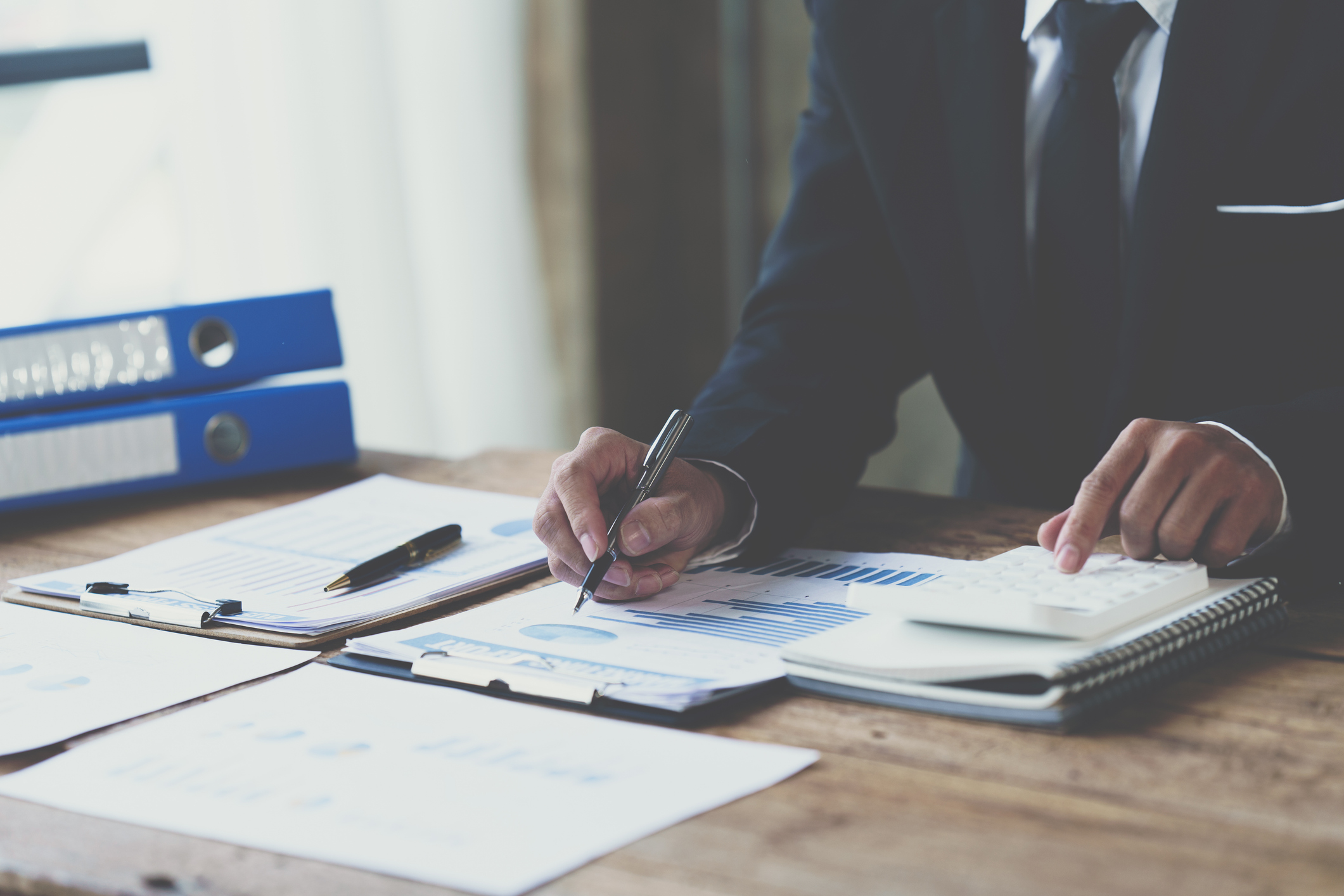 investor reviewing paperwork