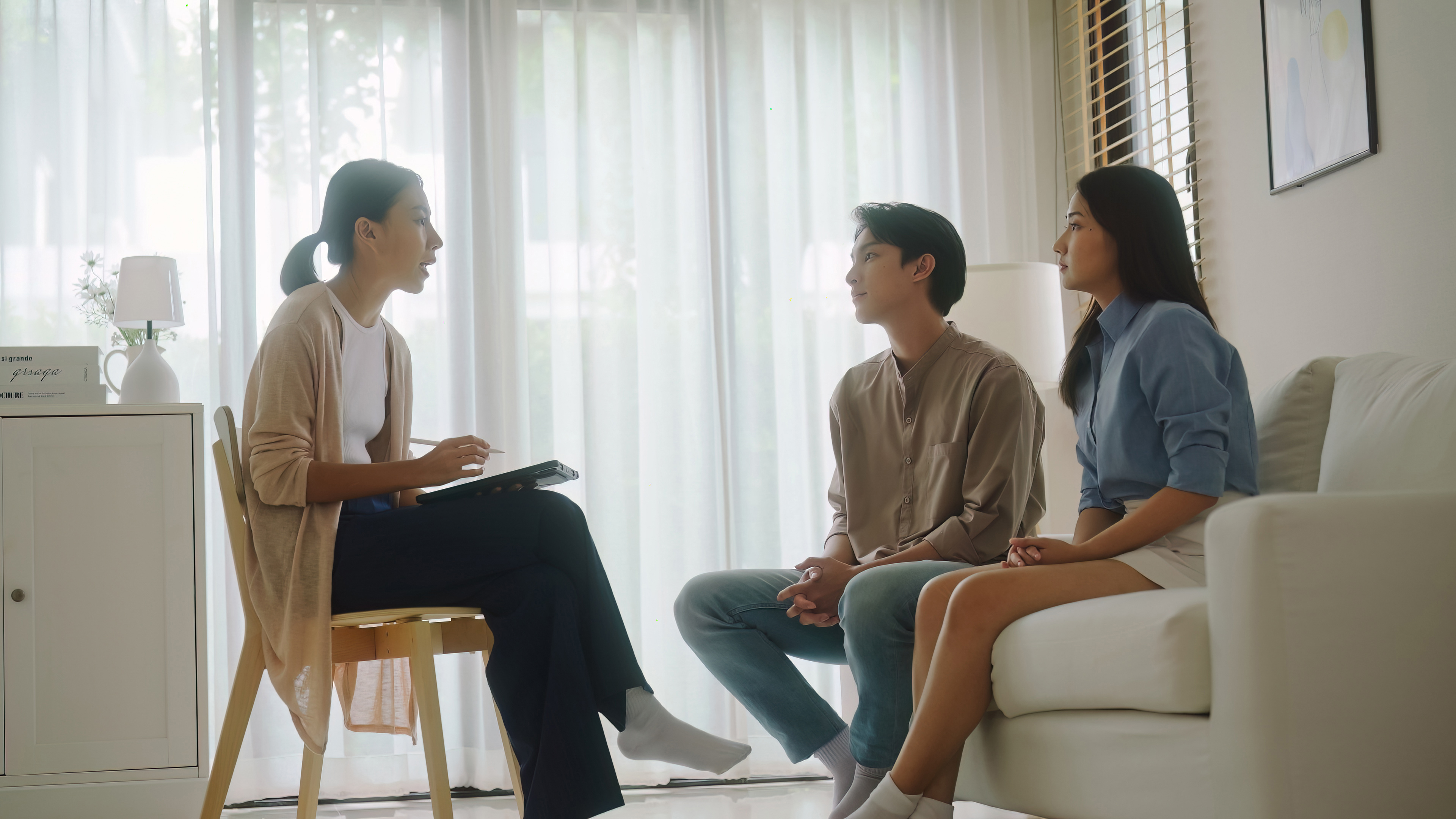 couple in mediation sitting on a couch